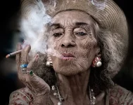 81562247_large_1325077673_oldwomansmokingsandypowers.webp