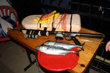 Rifle and fish.webp